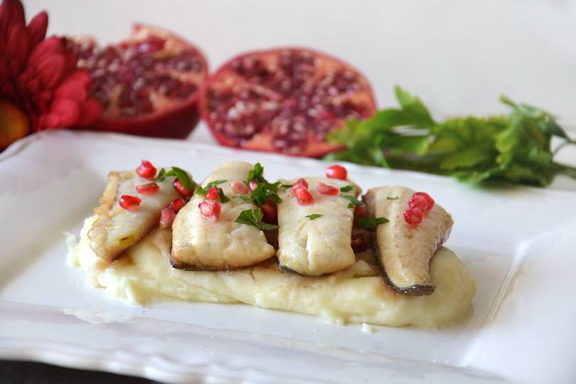 Filetti di branzino al melograno